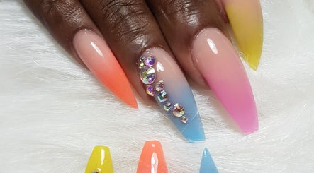 Vibrant nail art with gems at Teaser's Nail Care, Bridgetown, Saint James, BB.