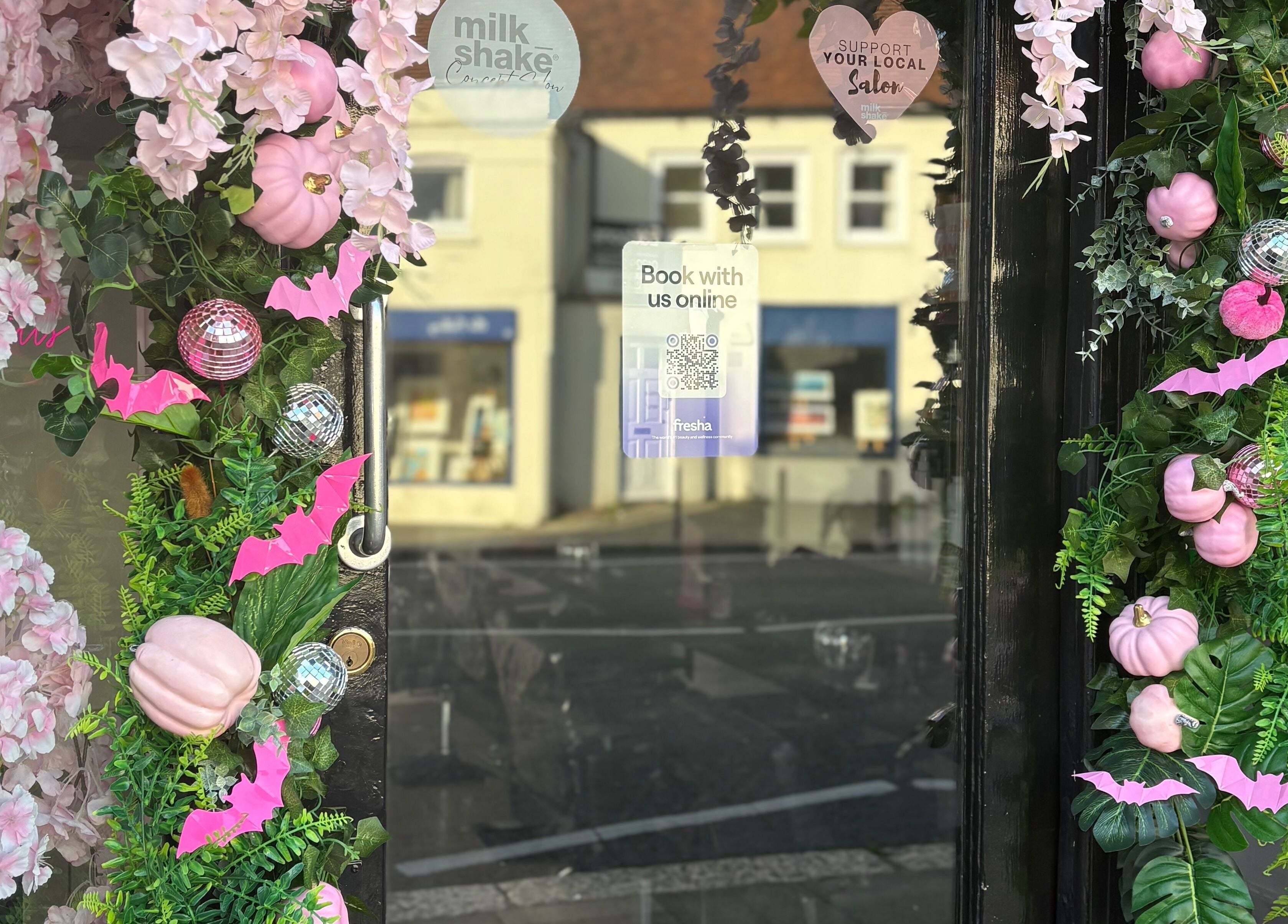 Charming pink floral and green display at Hair at O’Neills, Fareham, England, GB entrance.