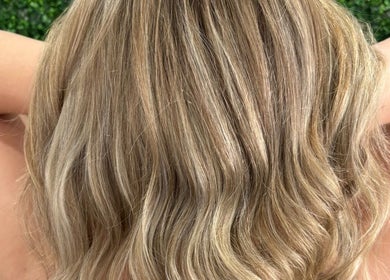 Blonde wavy hairstyle showcased at Tathra HairStudio, Tathra, New South Wales, AU.