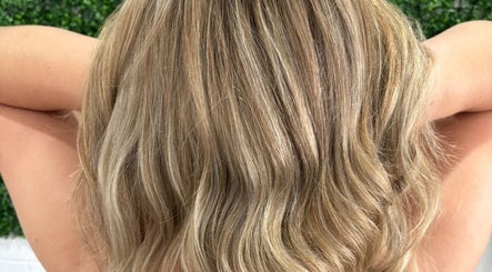 Blonde wavy hairstyle showcased at Tathra HairStudio, Tathra, New South Wales, AU.