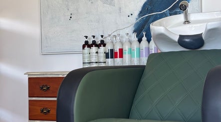 Comfortable salon chair and products at Tathra HairStudio, Tathra, New South Wales, AU.