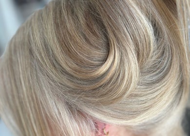 Elegant updo hairstyle showcased at Tathra HairStudio, Tathra, New South Wales, AU.