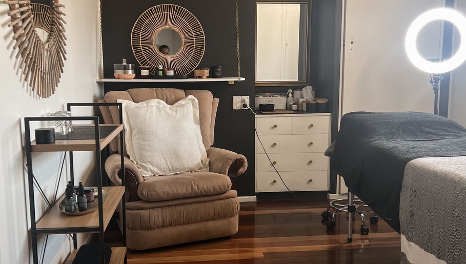 Inviting beauty room at Beauty Bar 11, Flinders View, Queensland, AU with plush seating and ambient lighting.