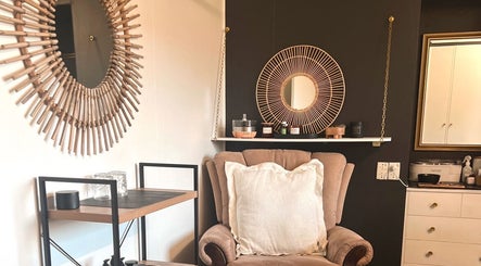 Comfortable seating area with stylish mirrors at Beauty Bar 11, Flinders View, Queensland, AU.