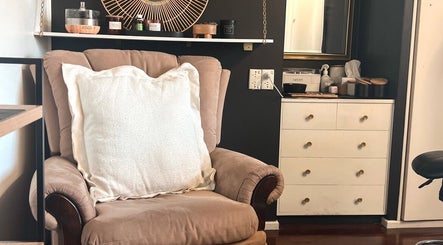 Inviting chair and elegant decor at Beauty Bar 11 in Flinders View, Queensland, AU enhancing relaxation.