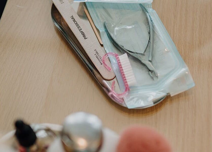 Manicure tools neatly arranged at The Pamper Room, Bern, Switzerland, CH, showcasing beauty services.