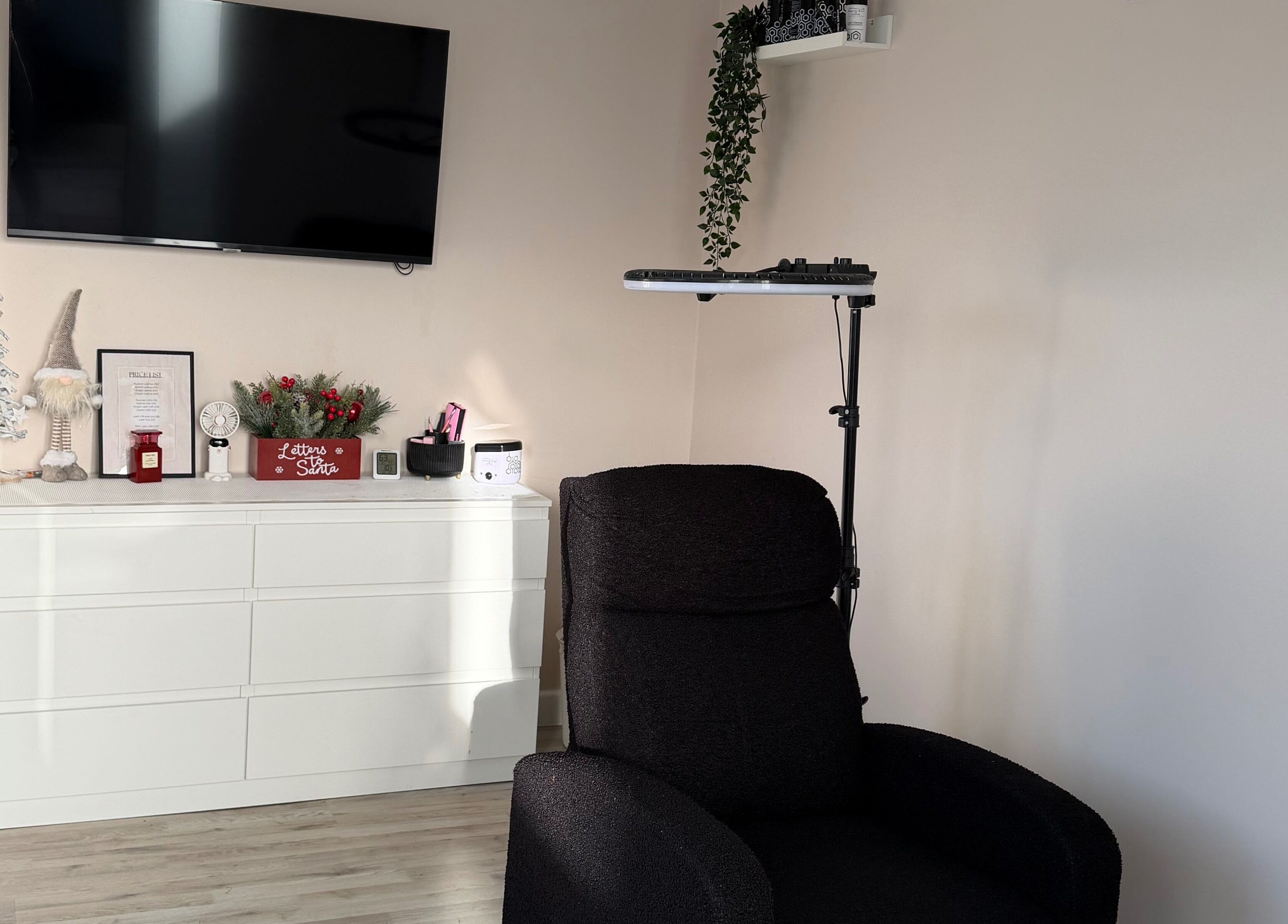Relaxing beauty setup at Naluna Beauty by Lauren in Garforth, England, featuring a plush chair and elegant decor.