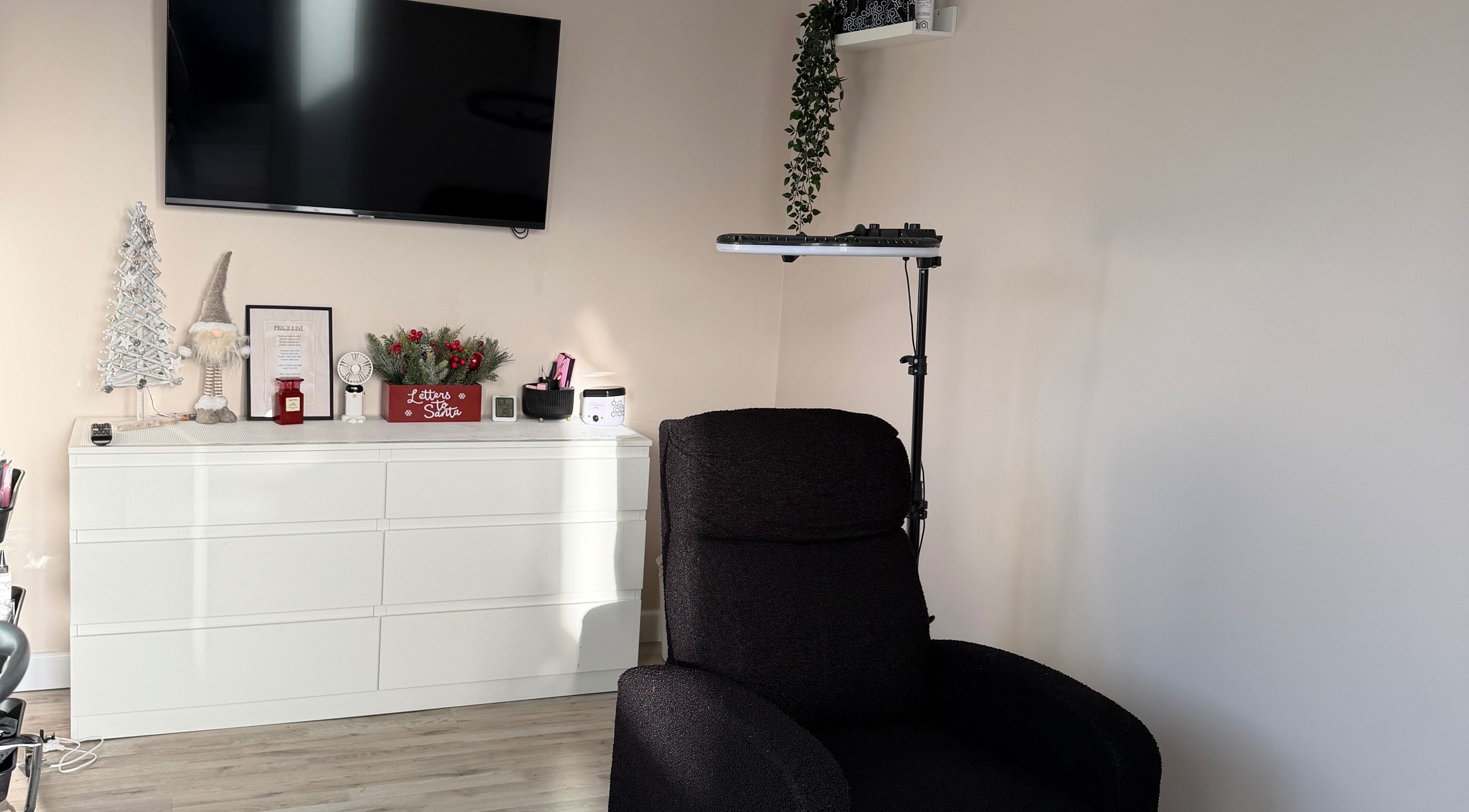Relaxing beauty setup at Naluna Beauty by Lauren in Garforth, England, featuring a plush chair and elegant decor.