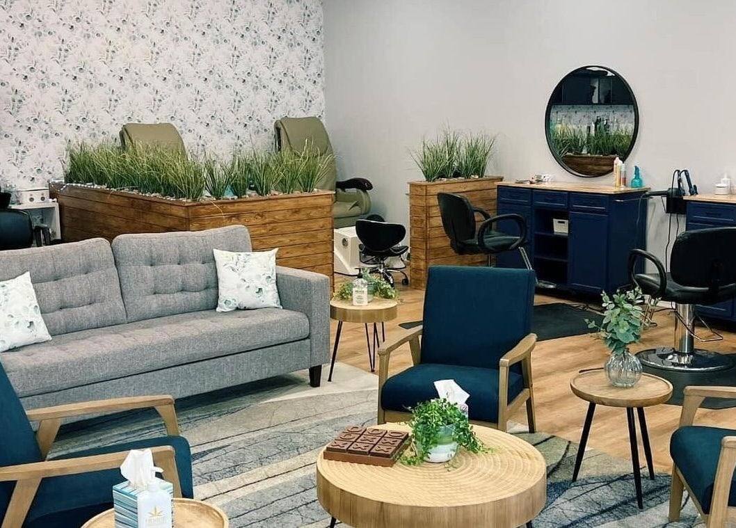 Cozy interior of Serendipity Hair and Nails in Davison, Michigan, US with modern seating and styling stations.