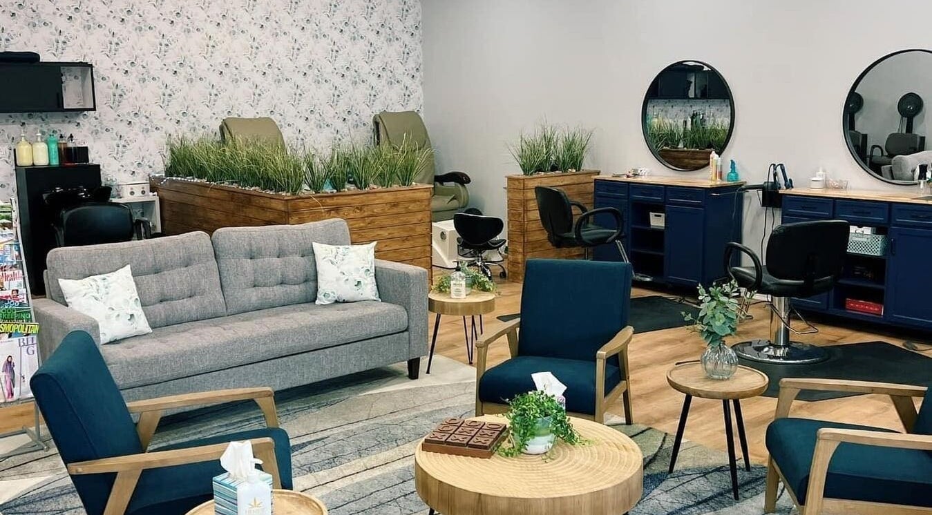 Cozy interior of Serendipity Hair and Nails in Davison, Michigan, US with modern seating and styling stations.