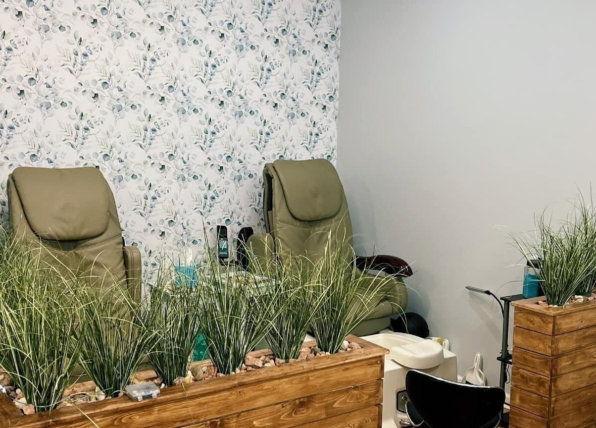 Relaxing pedicure chairs and greenery at Serendipity Hair and Nails in Davison, Michigan, US.