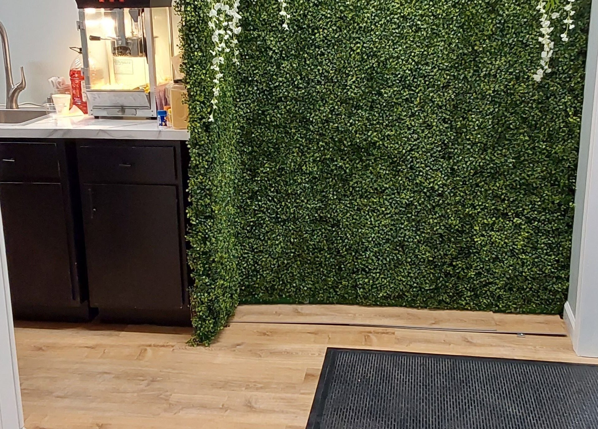 Serendipity Hair and Nails interior green wall and counter in Davison, Michigan, US.