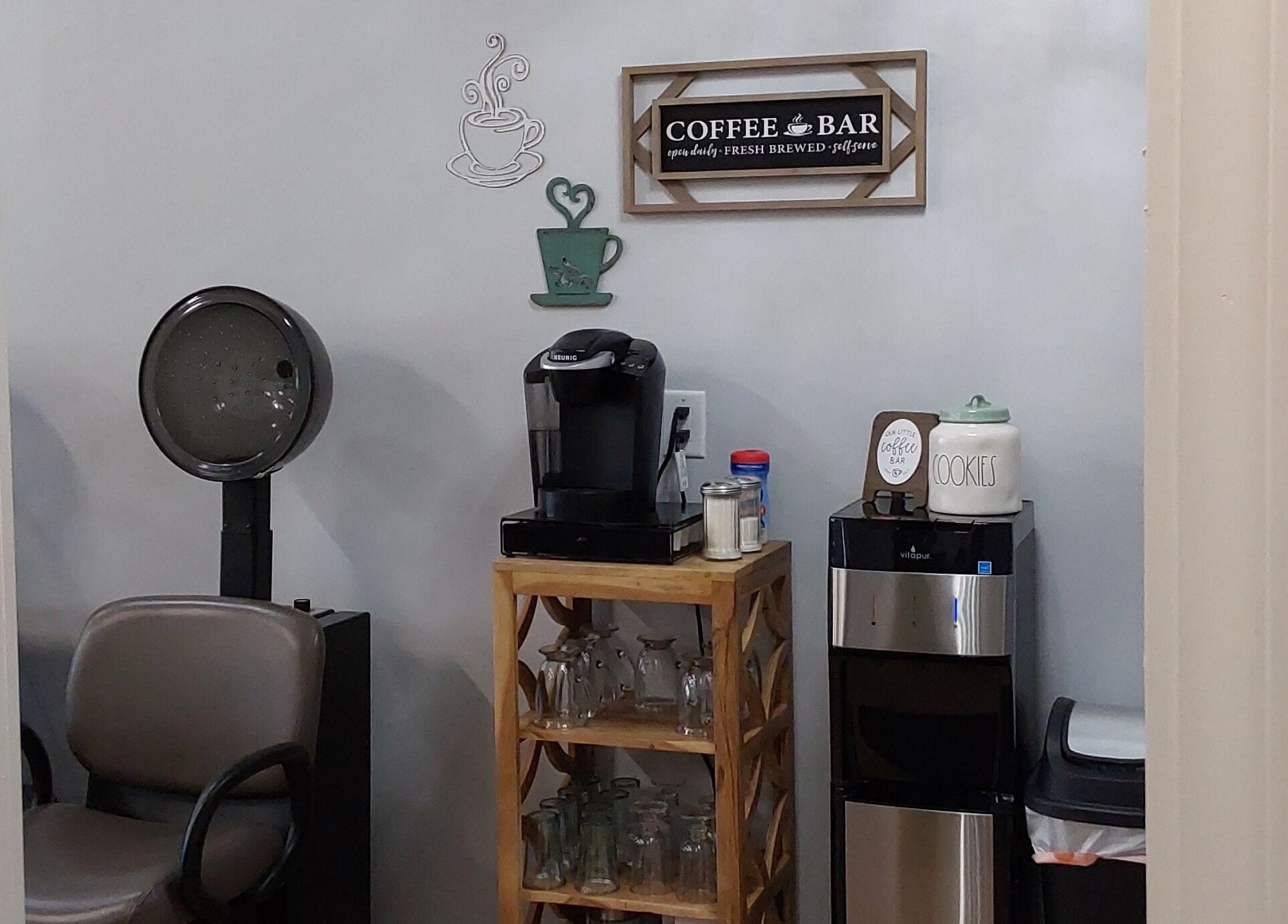 Relaxing coffee nook at Serendipity Hair and Nails, Davison, Michigan, US with a cozy ambience.