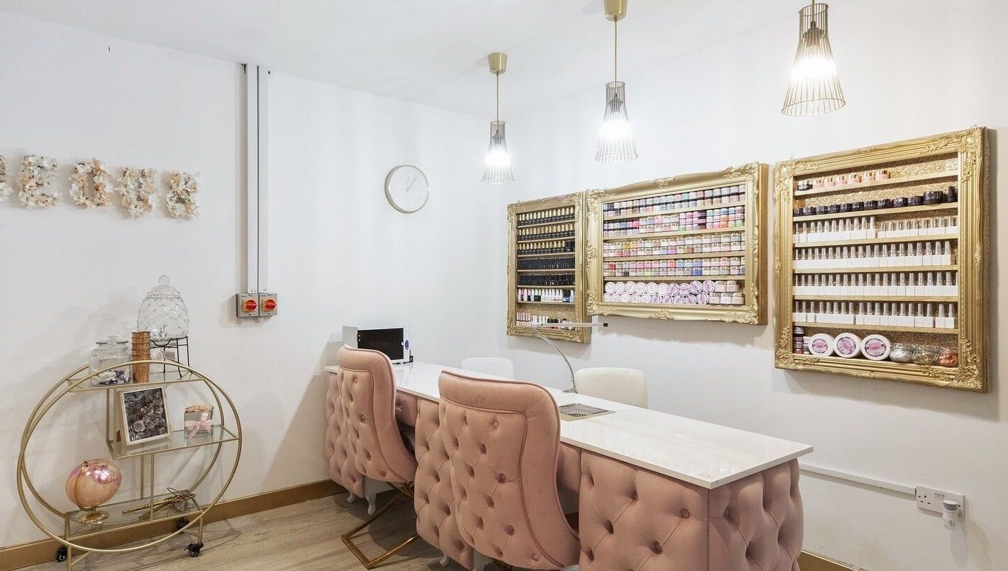 Elegant Beautify by Bailey salon interior in Willenhall, England, GB with plush chairs and product displays.