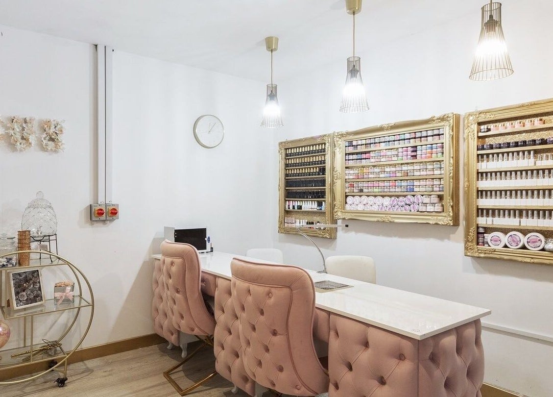 Elegant Beautify by Bailey salon interior in Willenhall, England, GB with plush chairs and product displays.