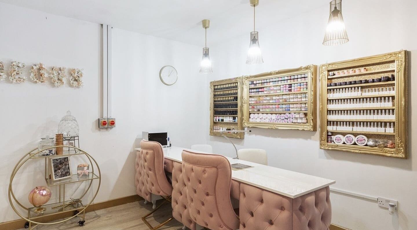 Elegant Beautify by Bailey salon interior in Willenhall, England, GB with plush chairs and product displays.