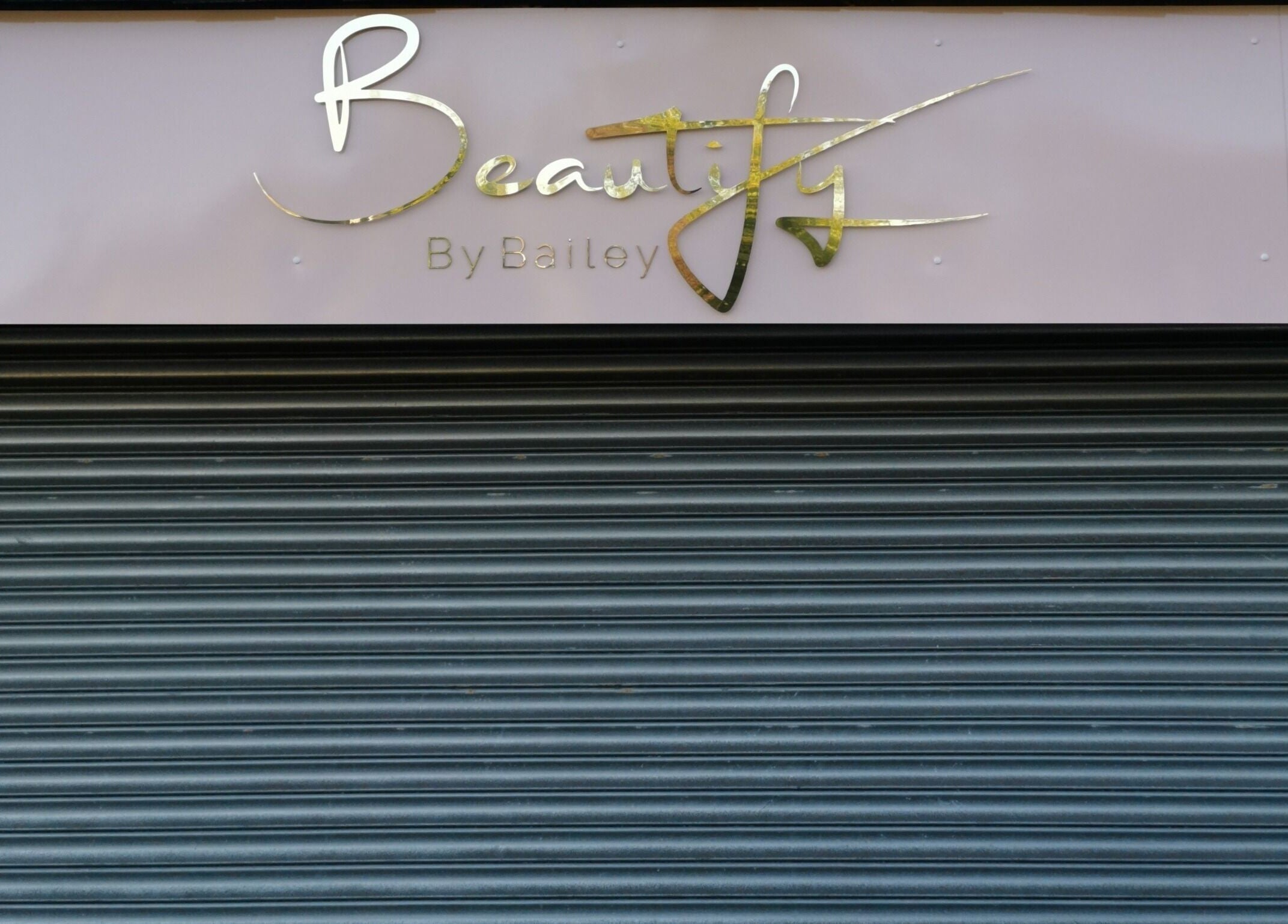 Front view of Beautify by Bailey, a beauty salon in Willenhall, England, GB, featuring a sleek modern sign.