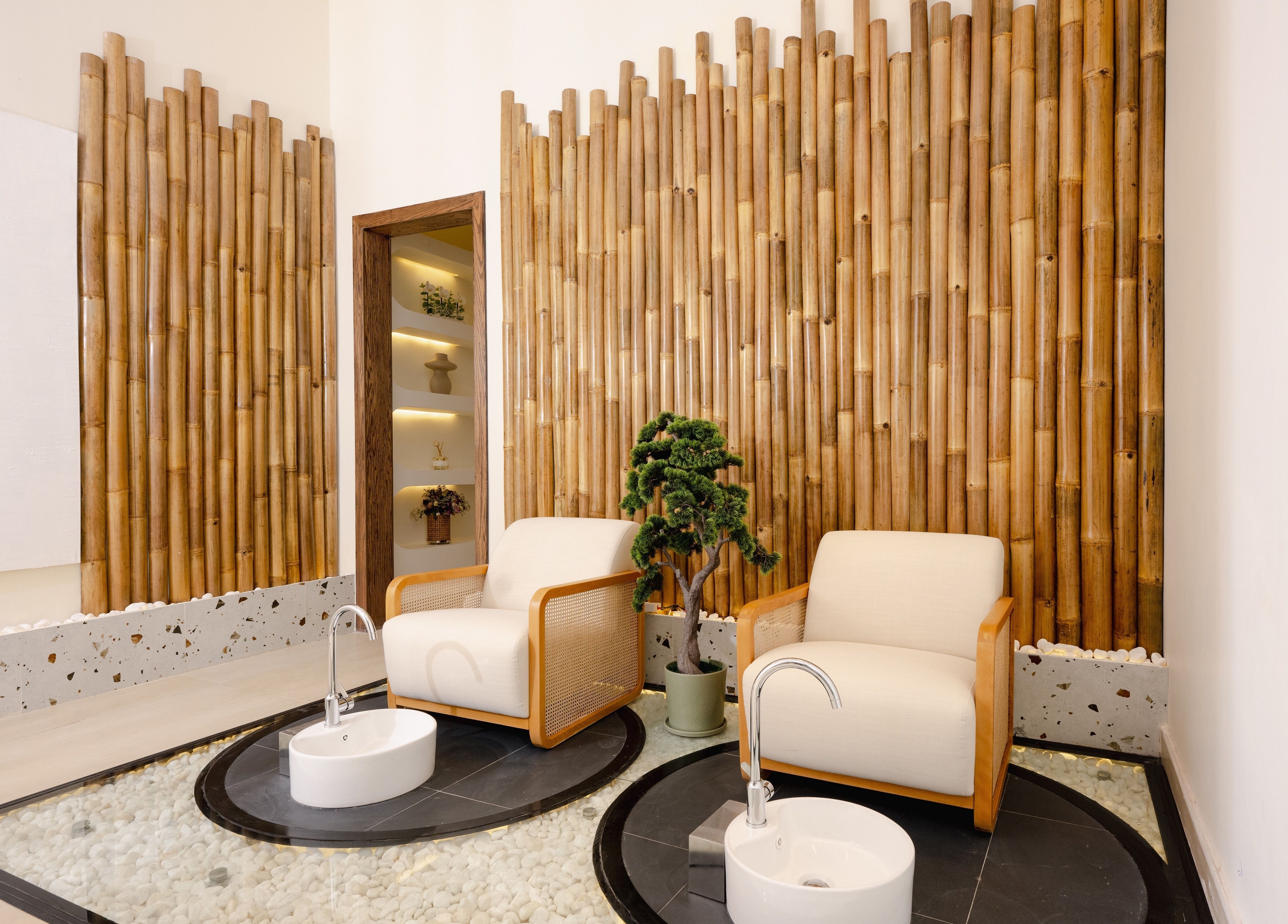 Cozy spa chairs and bamboo decor at Hello Lashes, Riyadh, Riyadh Province, SA offer a serene ambiance.