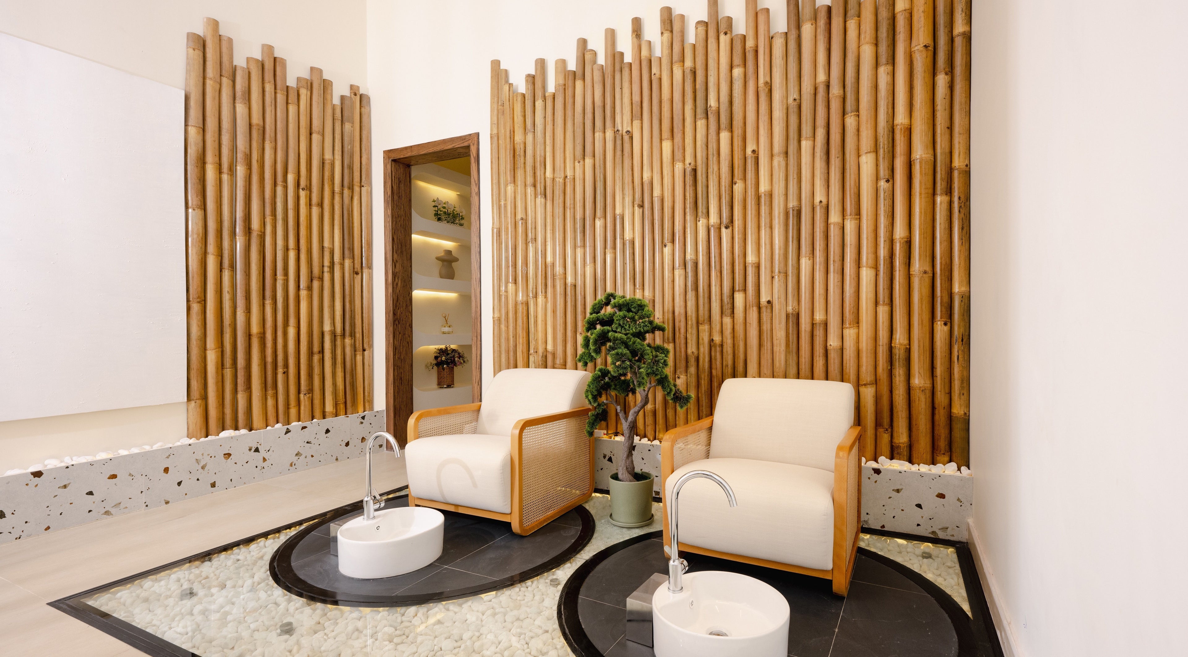 Cozy spa chairs and bamboo decor at Hello Lashes, Riyadh, Riyadh Province, SA offer a serene ambiance.