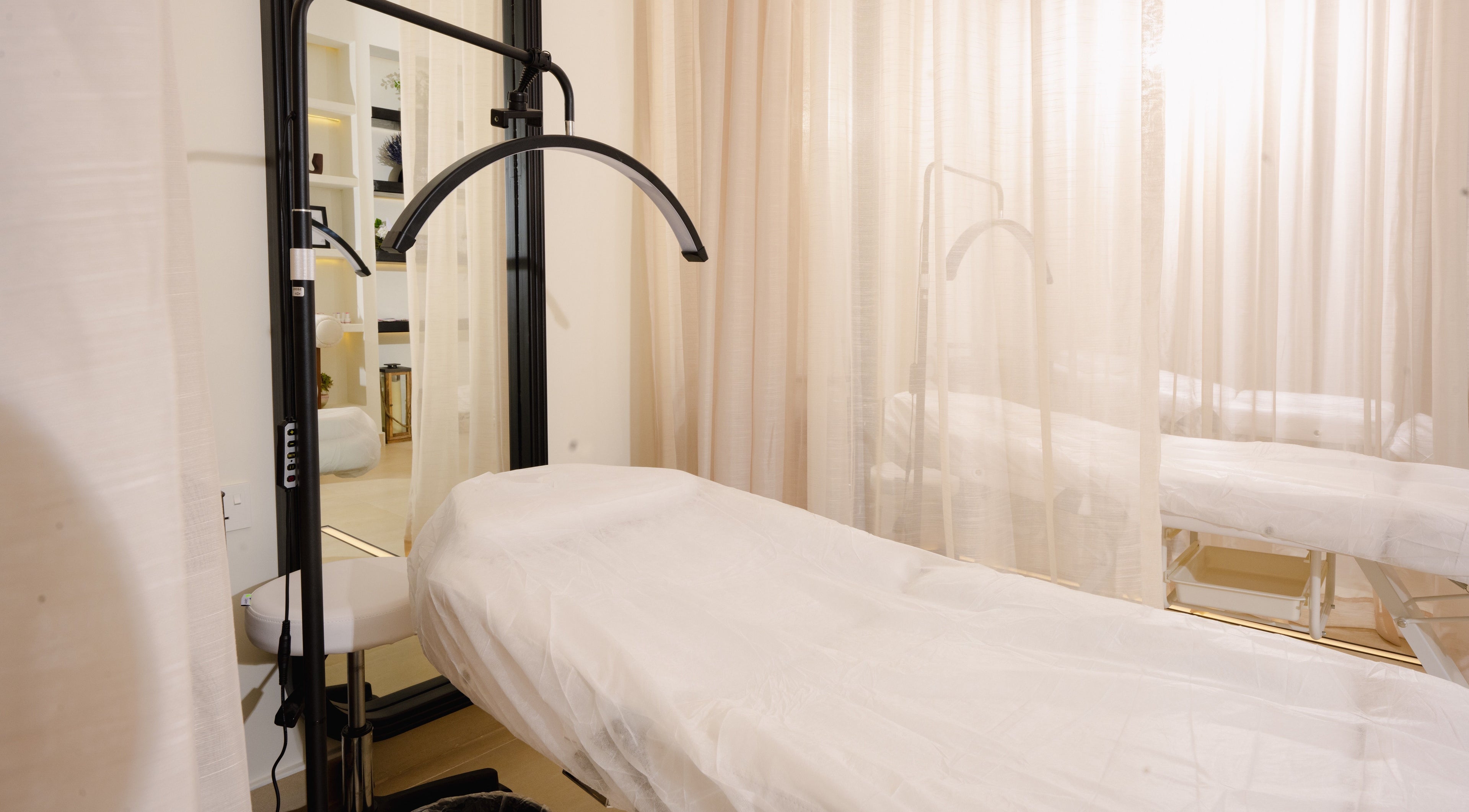 Tranquil treatment area at Hello Lashes, Riyadh, Riyadh Province, SA with soft lighting and a treatment bed.