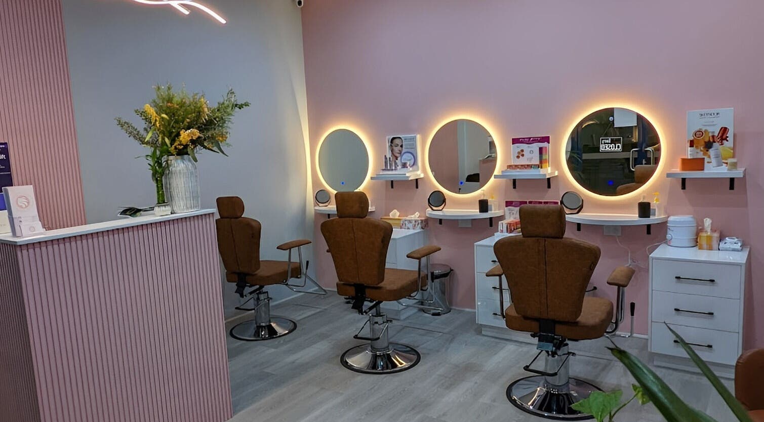 Elegant makeup chairs and lit mirrors at Walkin Pamper Beauty Bar, Wagga Wagga, New South Wales, AU.