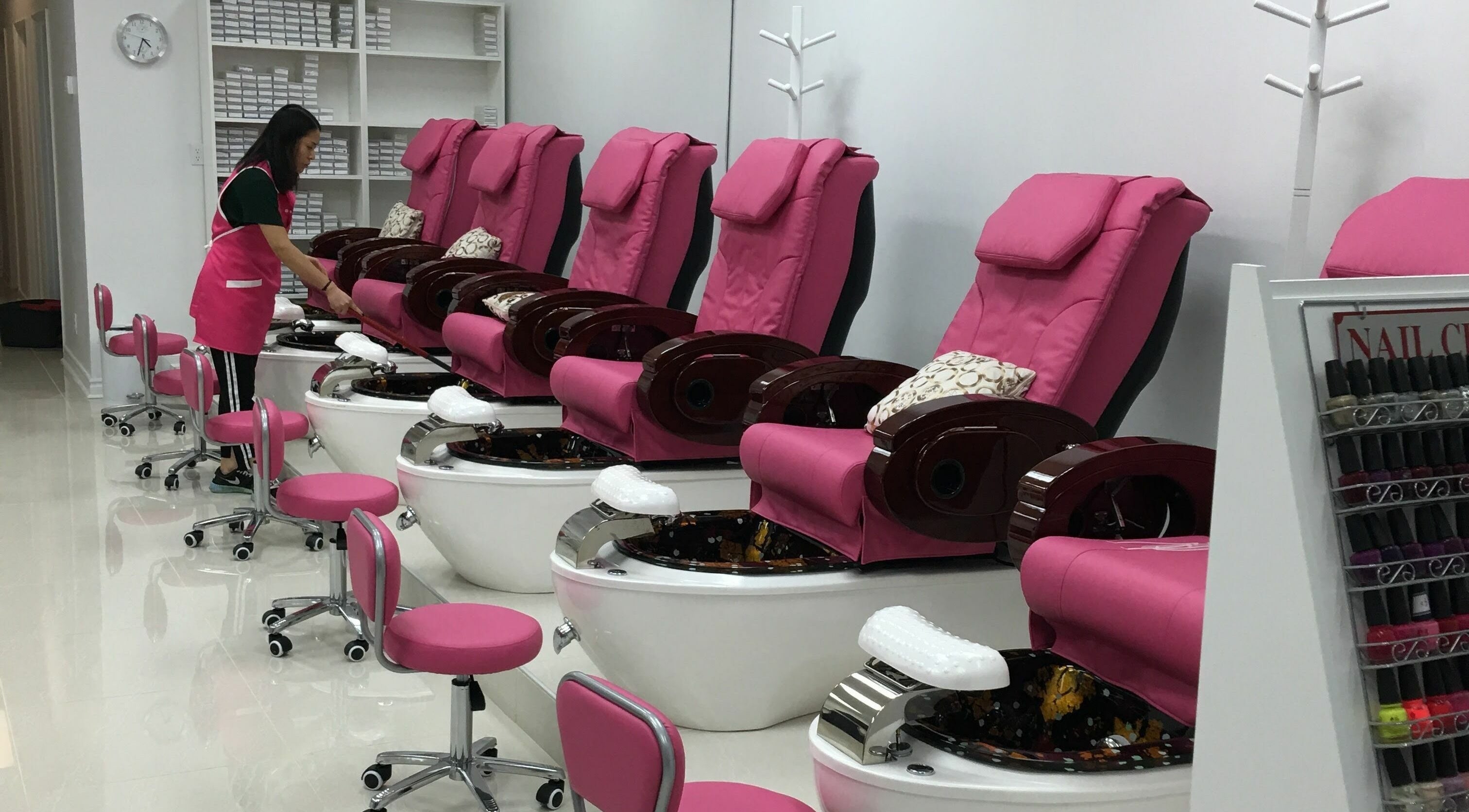 Luxurious pedicure chairs at Leah's Nails Bathurst, Newmarket, Ontario, CA with vibrant pink accents.