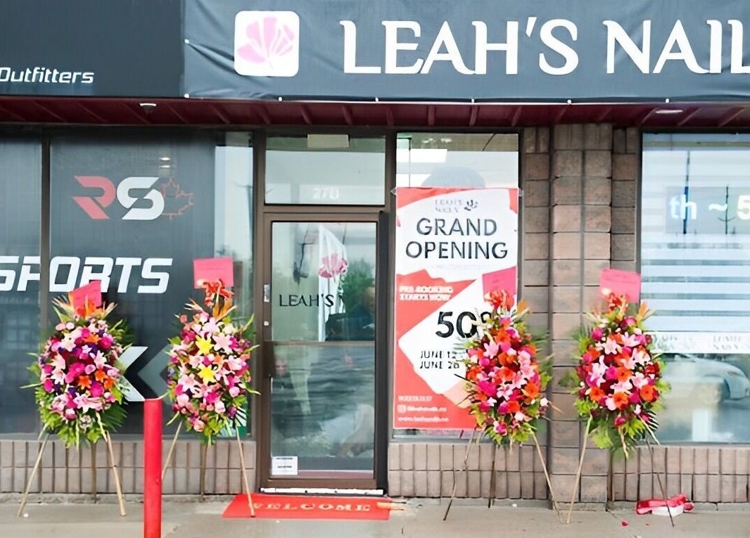 Leah's Nails Davis grand opening with vibrant floral displays in Newmarket, Ontario, CA.