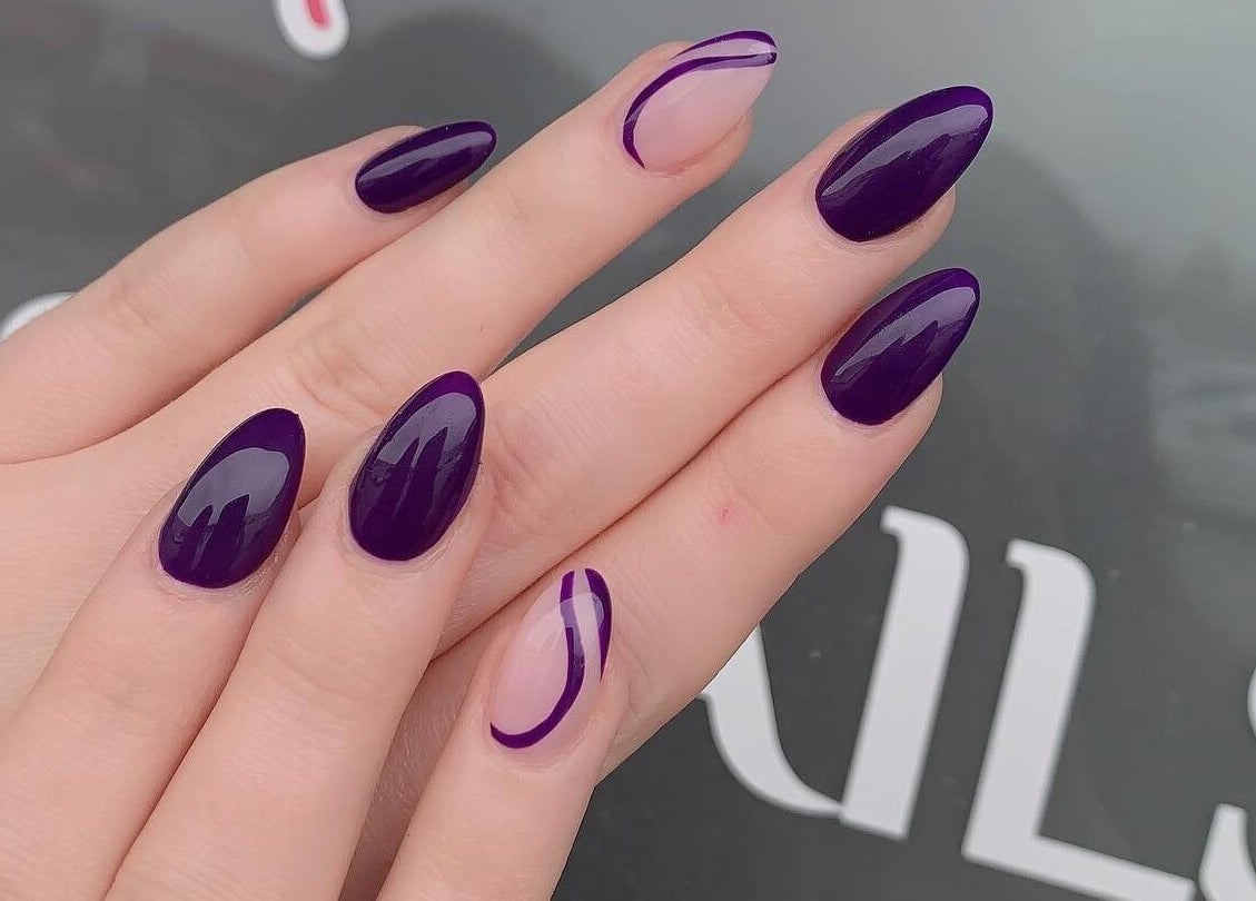 Elegant purple nails at Leah's Nails Davis, Newmarket, Ontario, CA showcasing unique design artistry.