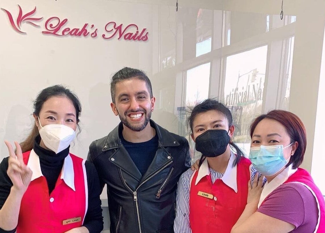 Leah's Nails Davis staff and happy visitor in Newmarket, Ontario, CA for a welcoming experience.