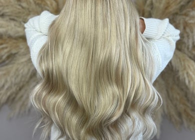 Elegant blonde waves hairstyle at Glamour, Bawtry, England, GB.