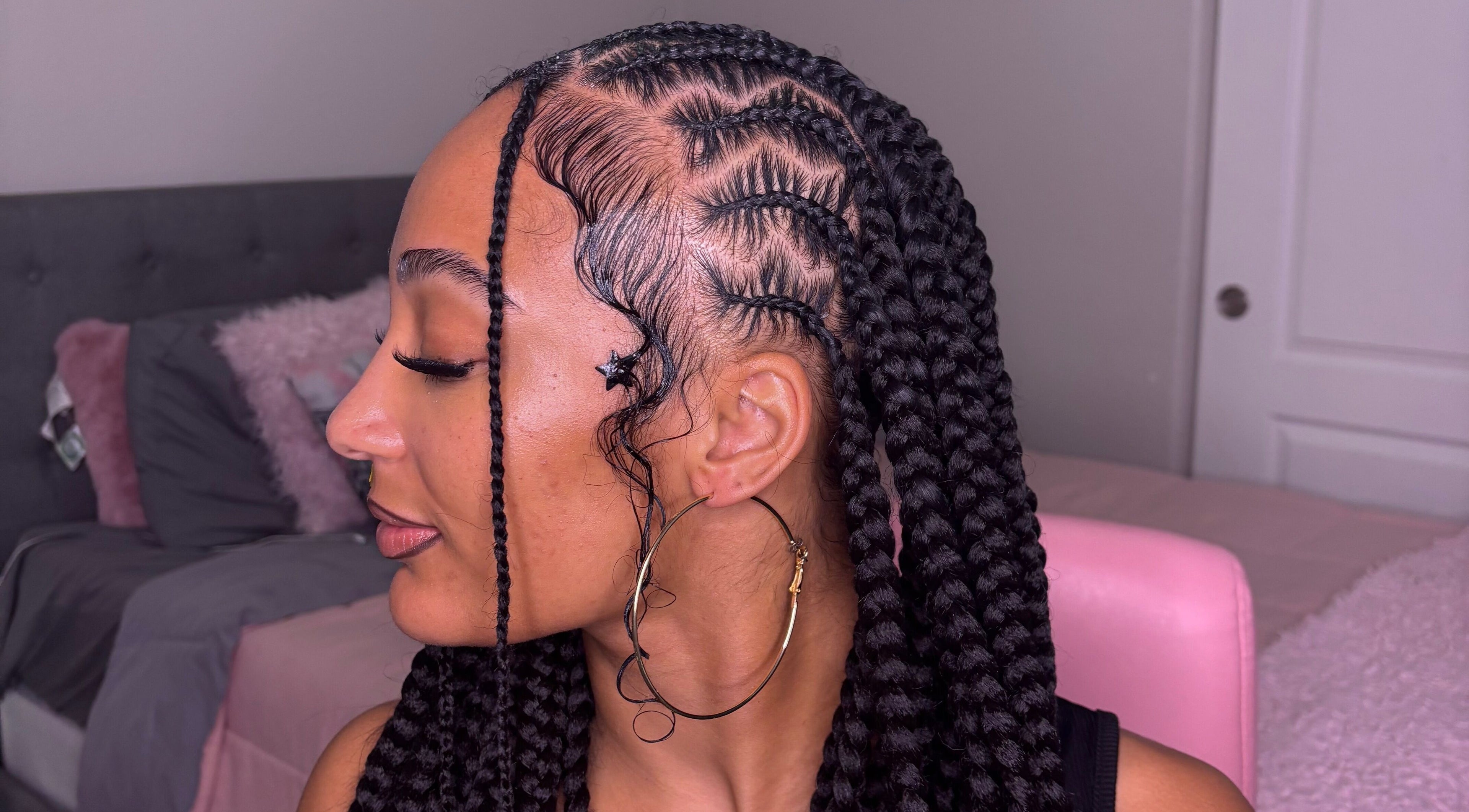 Detailed cornrow braiding style at Braided By Angel, North Hollywood, California, US.