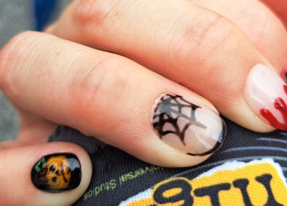 Halloween-themed nail art featuring webs at Lashes by Dee, Weymouth, England, GB.