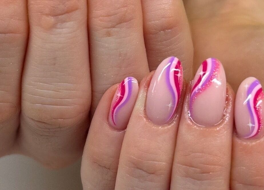 Vibrant swirl nail art by By Emer, carlow, carlow, IE showcases creative designs with pink and purple hues.