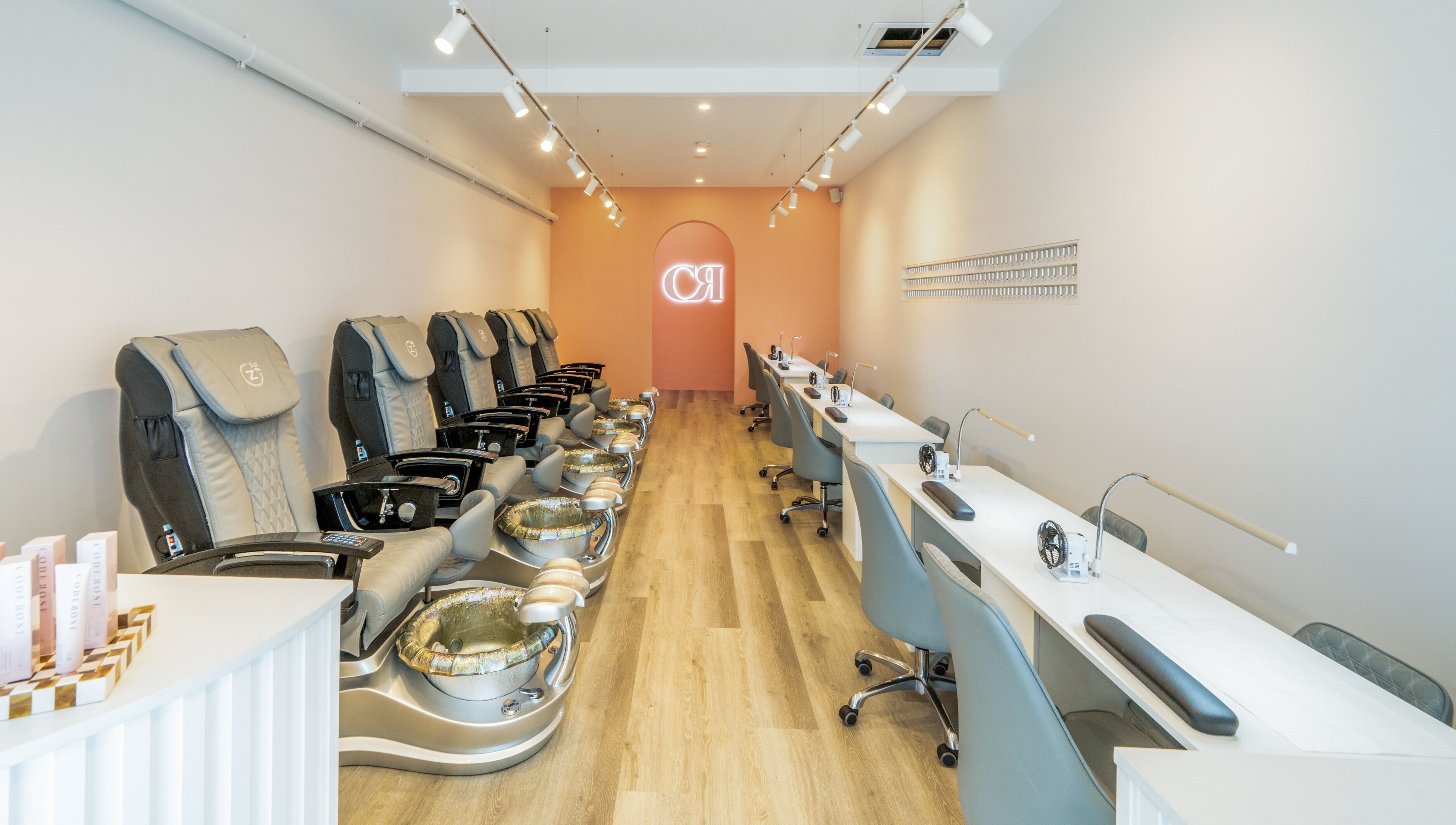 Elegant interior of Code Rose - Yarraville, featuring plush spa chairs and sleek design in Melbourne, Victoria, AU.