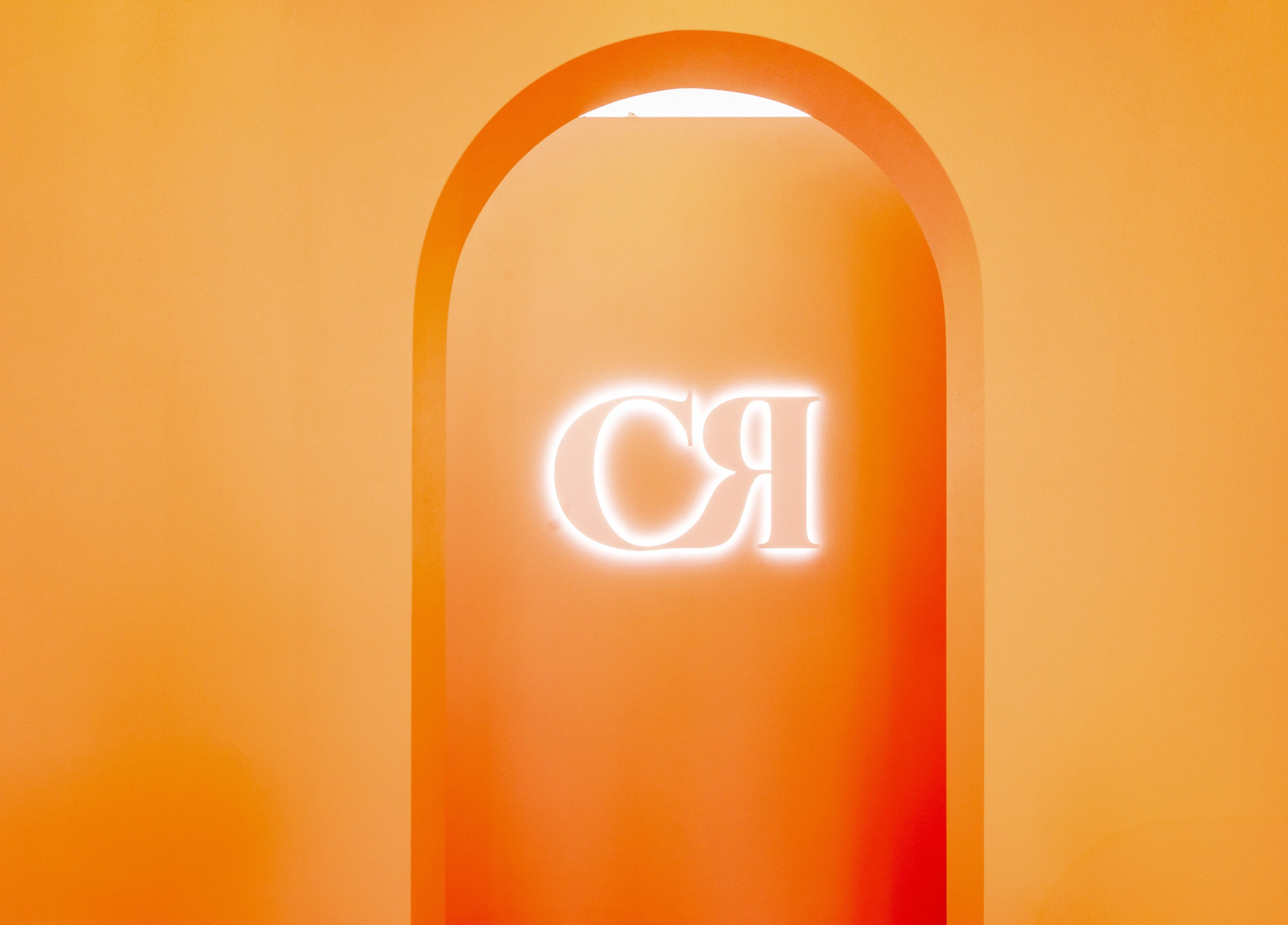 Illuminated archway at Code Rose - Yarraville, Melbourne, Victoria, AU with glowing initials.