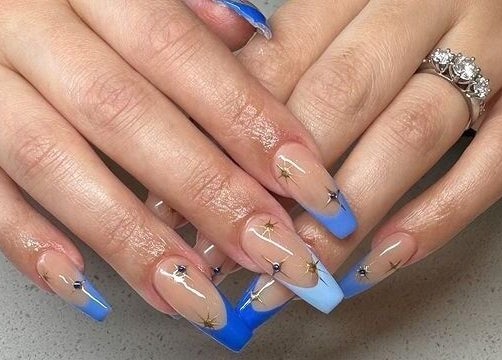 Elegant blue and starry nail art at Code Rose - Avondale Heights, enhancing beauty in Avondale Heights, VIC, AU.