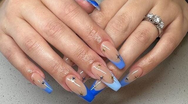 Elegant blue and starry nail art at Code Rose - Avondale Heights, enhancing beauty in Avondale Heights, VIC, AU.