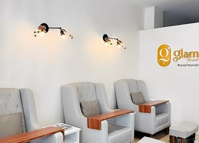 Stylish chairs at Glamore Beauty Lounge Jaro Branch, Iloilo City, Western Visayas, PH with elegant lighting.