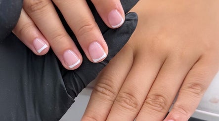 Elegant French manicure at Bella nails and beauty xx in Halstead, England, GB. Perfectly styled nails.