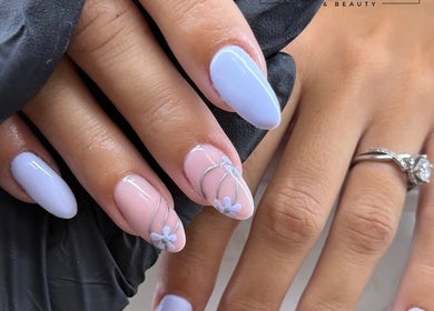 Elegant floral nail design at Bella nails and beauty xx in Halstead, England, GB.
