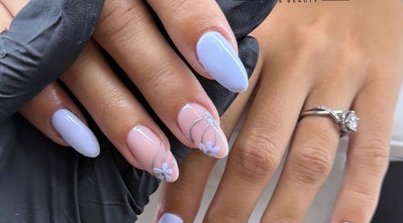 Elegant floral nail design at Bella nails and beauty xx in Halstead, England, GB.