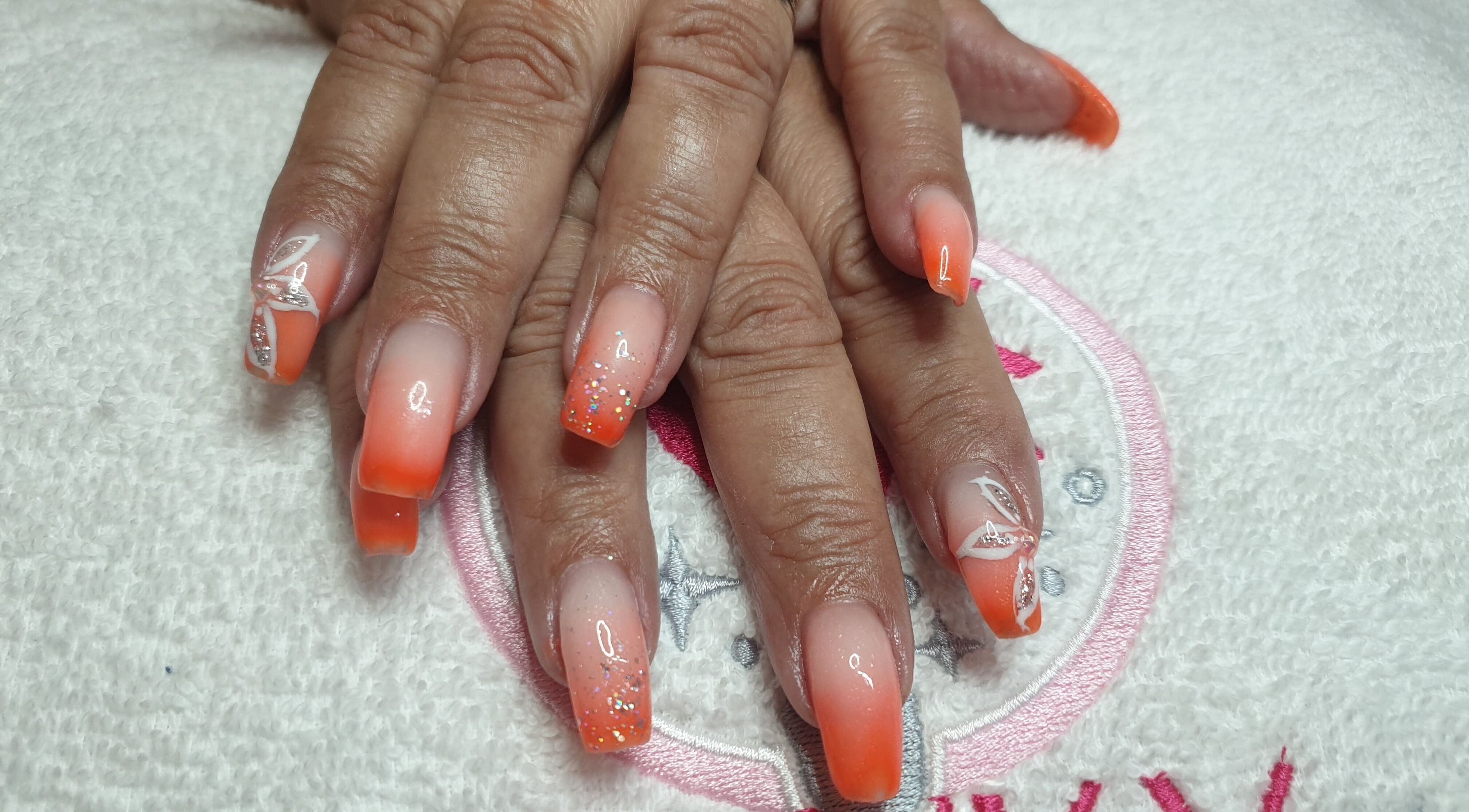 Elegant orange ombre nails with glitter at Funky Nails, Johannesburg, Gauteng, ZA.