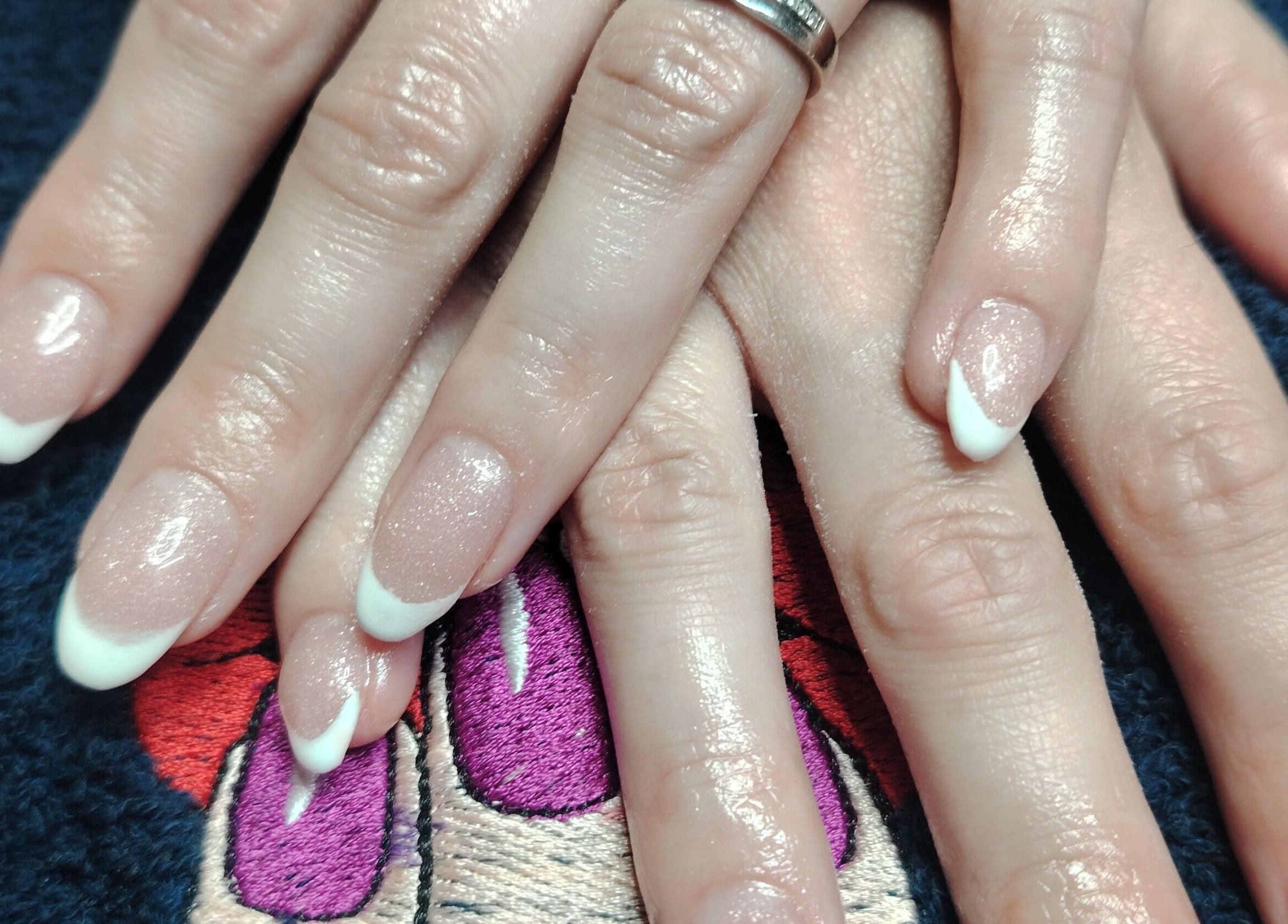 Elegant French manicure at Funky Nails in Alberton, Gauteng, ZA. Perfect nails for stylish looks.