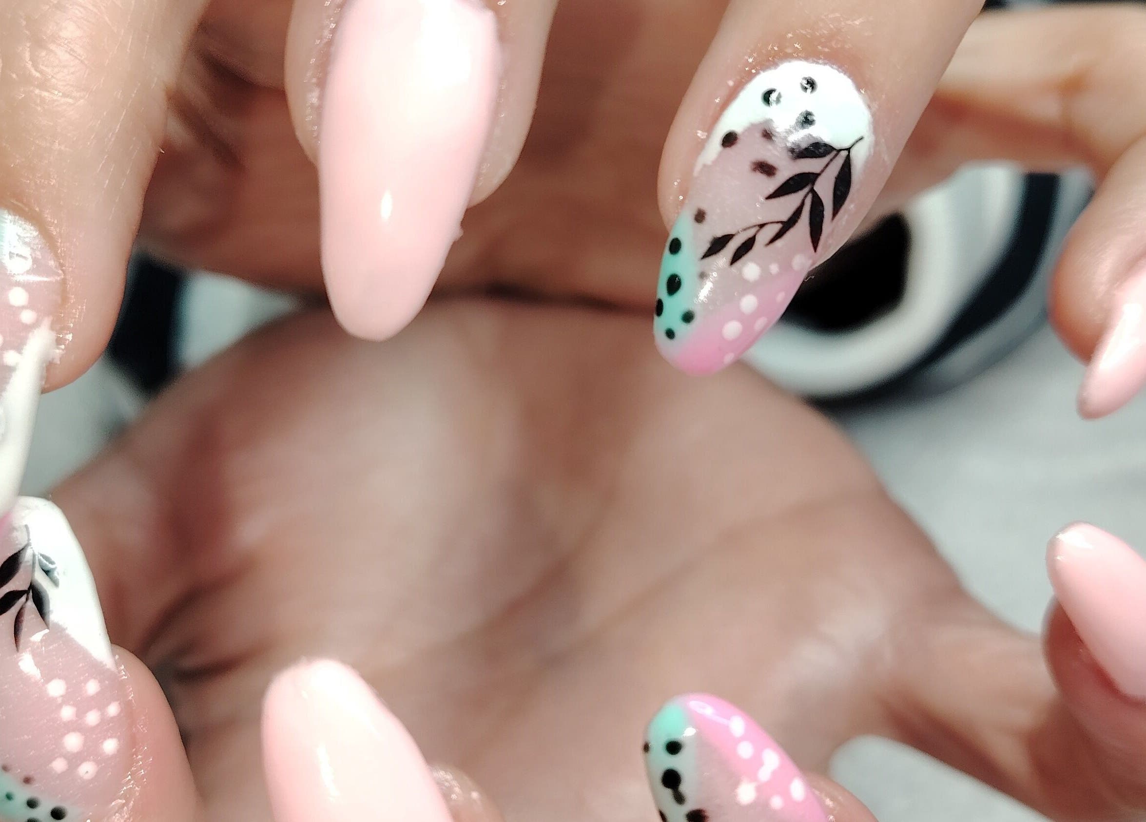 Colorful nail art design at Funky Nails, Alberton, Gauteng, ZA showcasing pink and floral accents.