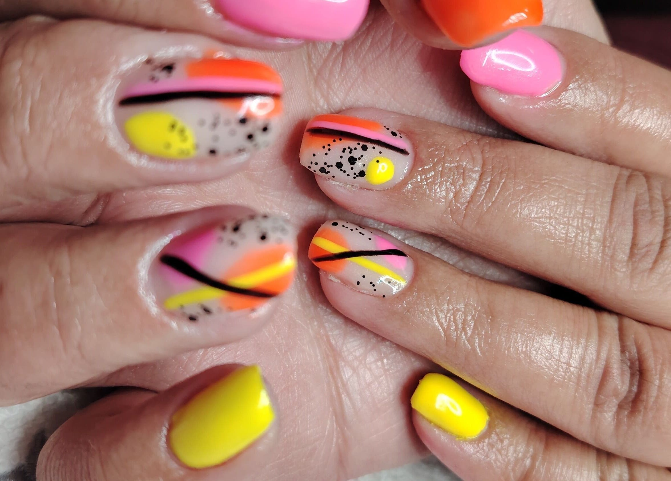 Vibrant neon nail art at Funky Nails, Alberton, Gauteng, ZA, showcasing intricate designs.