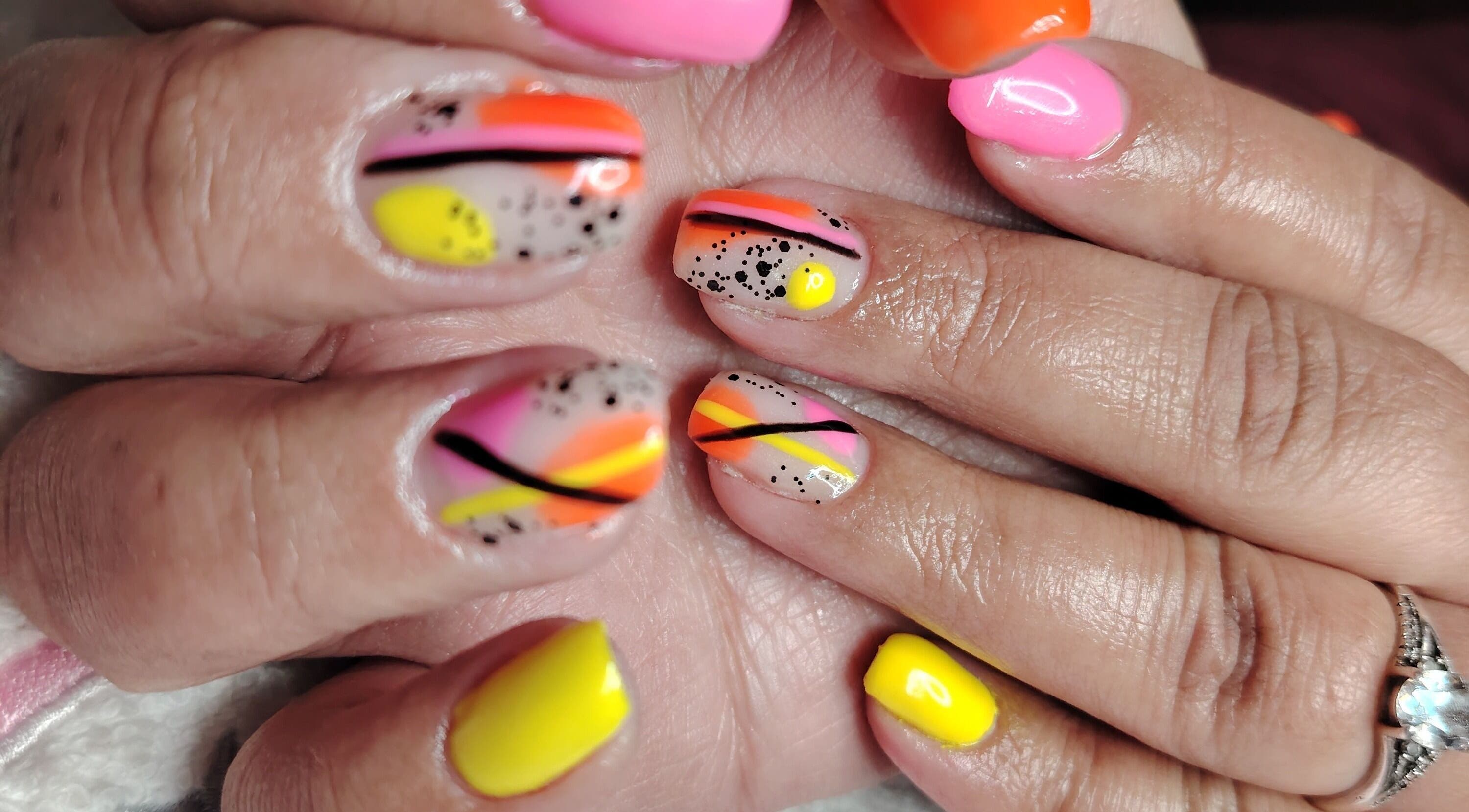 Vibrant neon nail art at Funky Nails, Alberton, Gauteng, ZA, showcasing intricate designs.