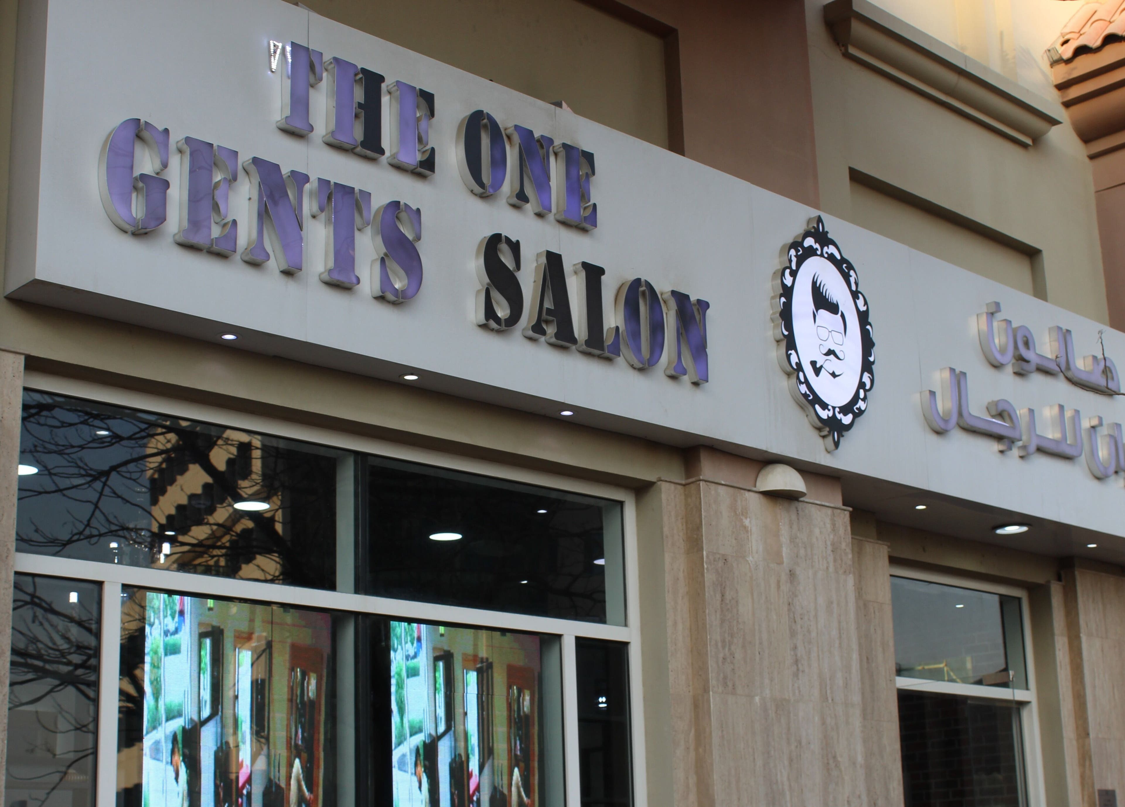 Exterior of The One Gents Salon (JVT Branch) in Dubai, Dubai, AE showing the main entrance and signage.