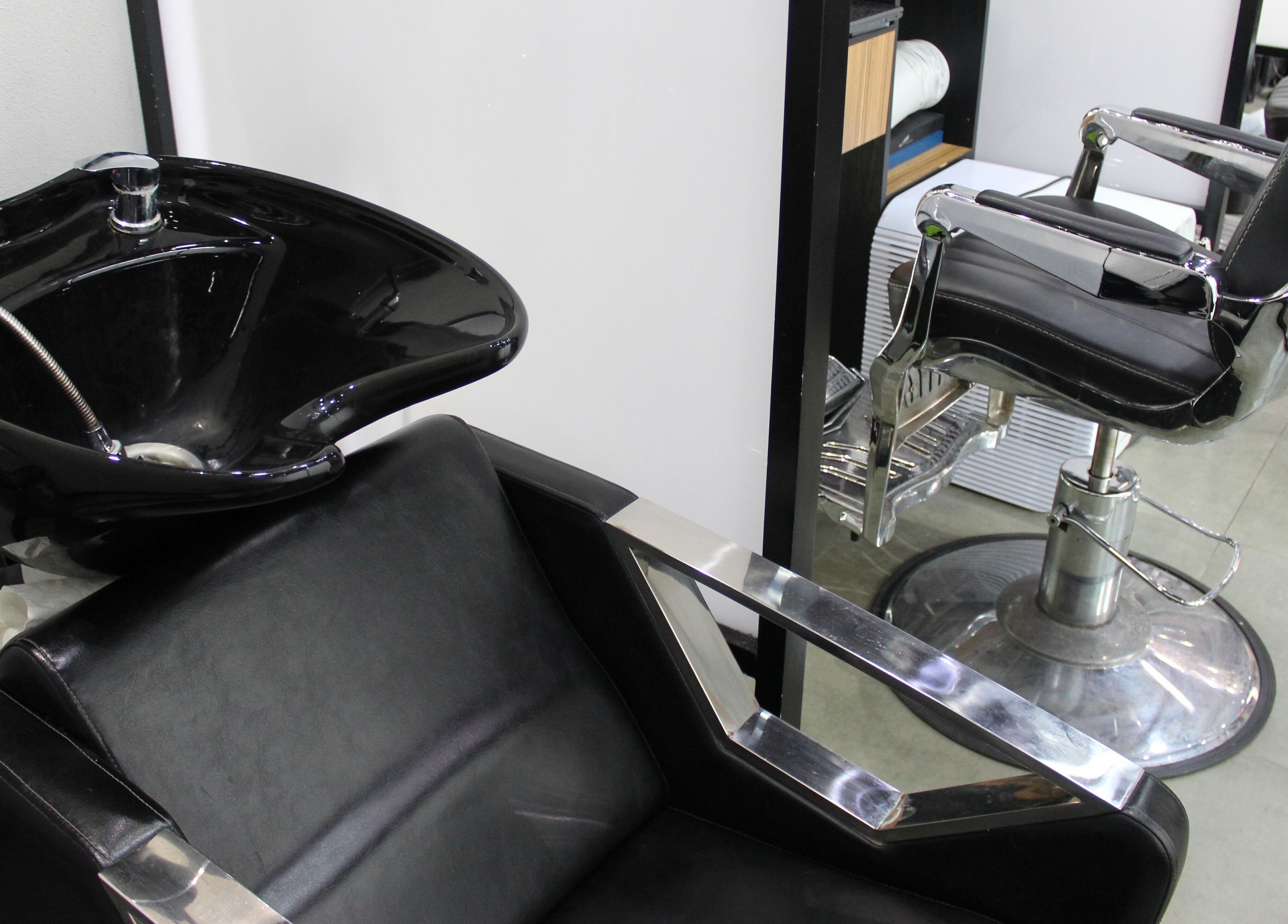 Black wash and styling chairs at The One Gents Salon (JVT Branch), Dubai, Dubai, AE.