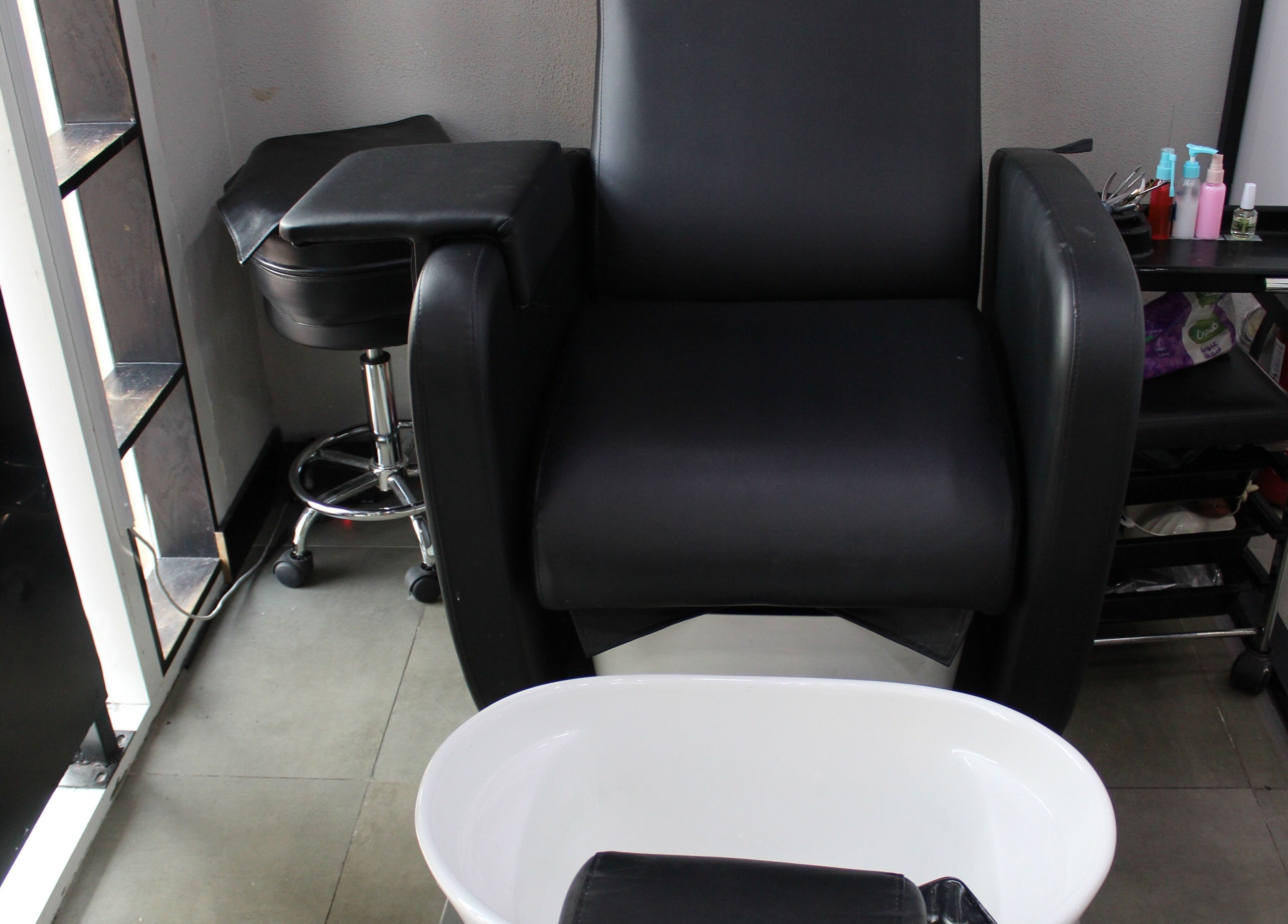 Luxurious pedicure chair at The One Gents Salon (JVT Branch), Dubai, Dubai, AE, offering ultimate relaxation.