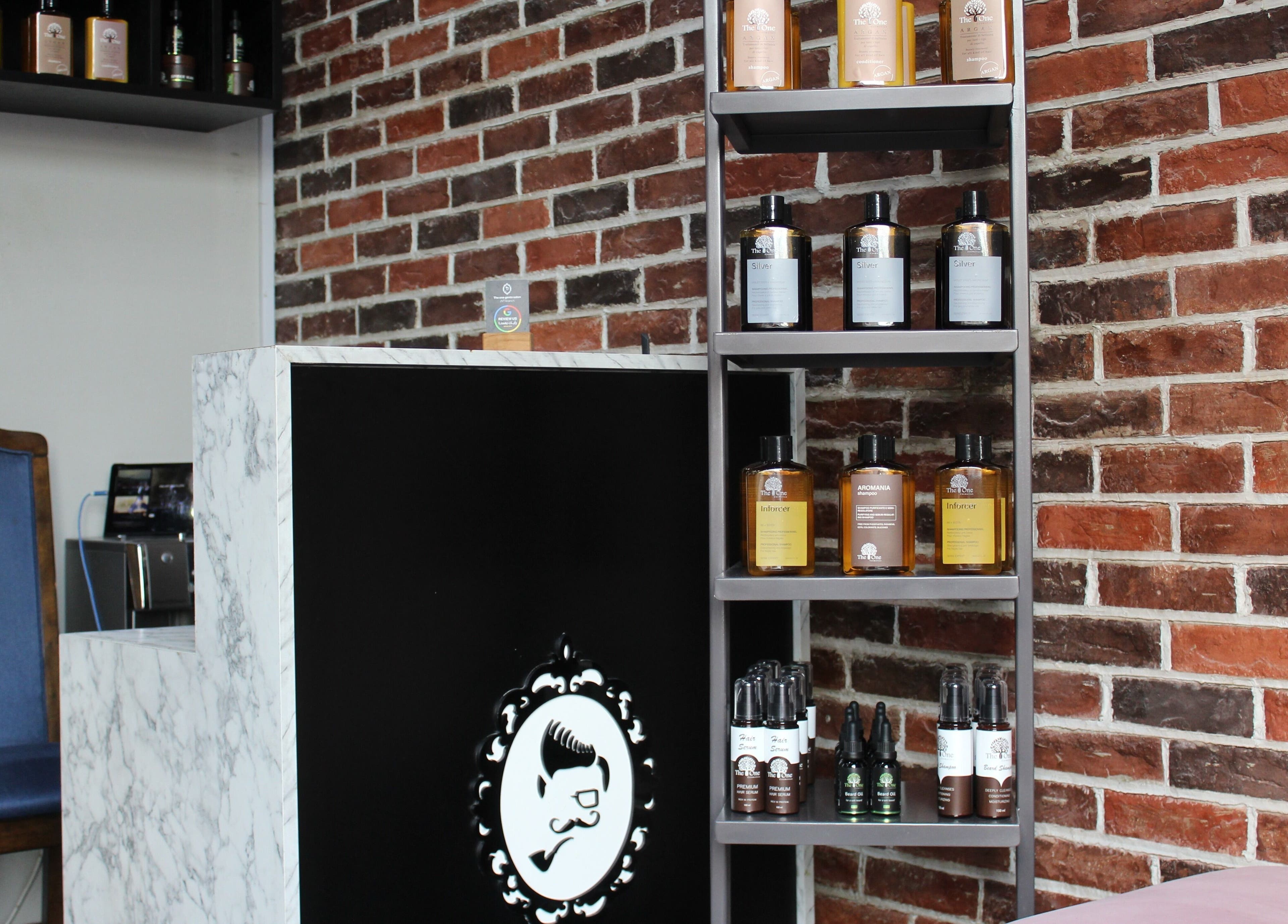 Interior of The One Gents Salon (JVT Branch) showcasing products in Dubai, Dubai, AE.